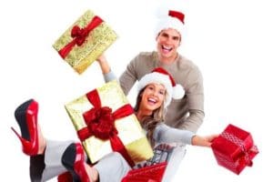 A woman and a man shopping with Christmas presents