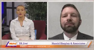 PA Live! Harold Shepley & Associates with two people talking and smiling at each other